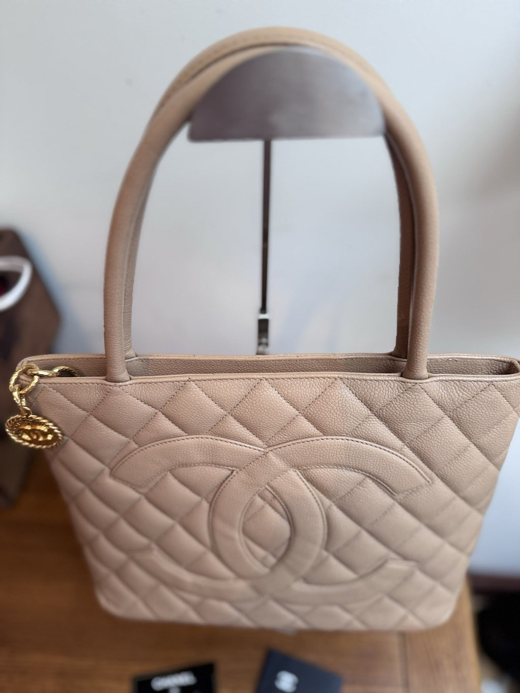 CHANEL Beige Medallion Tote,zip Closure quilted caviar leather
