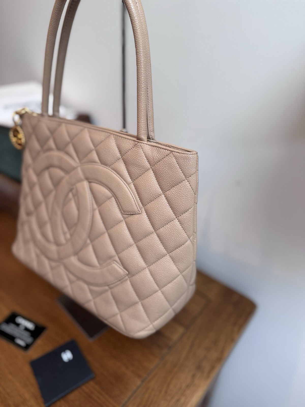 CHANEL Beige Medallion Tote,zip Closure quilted caviar leather
