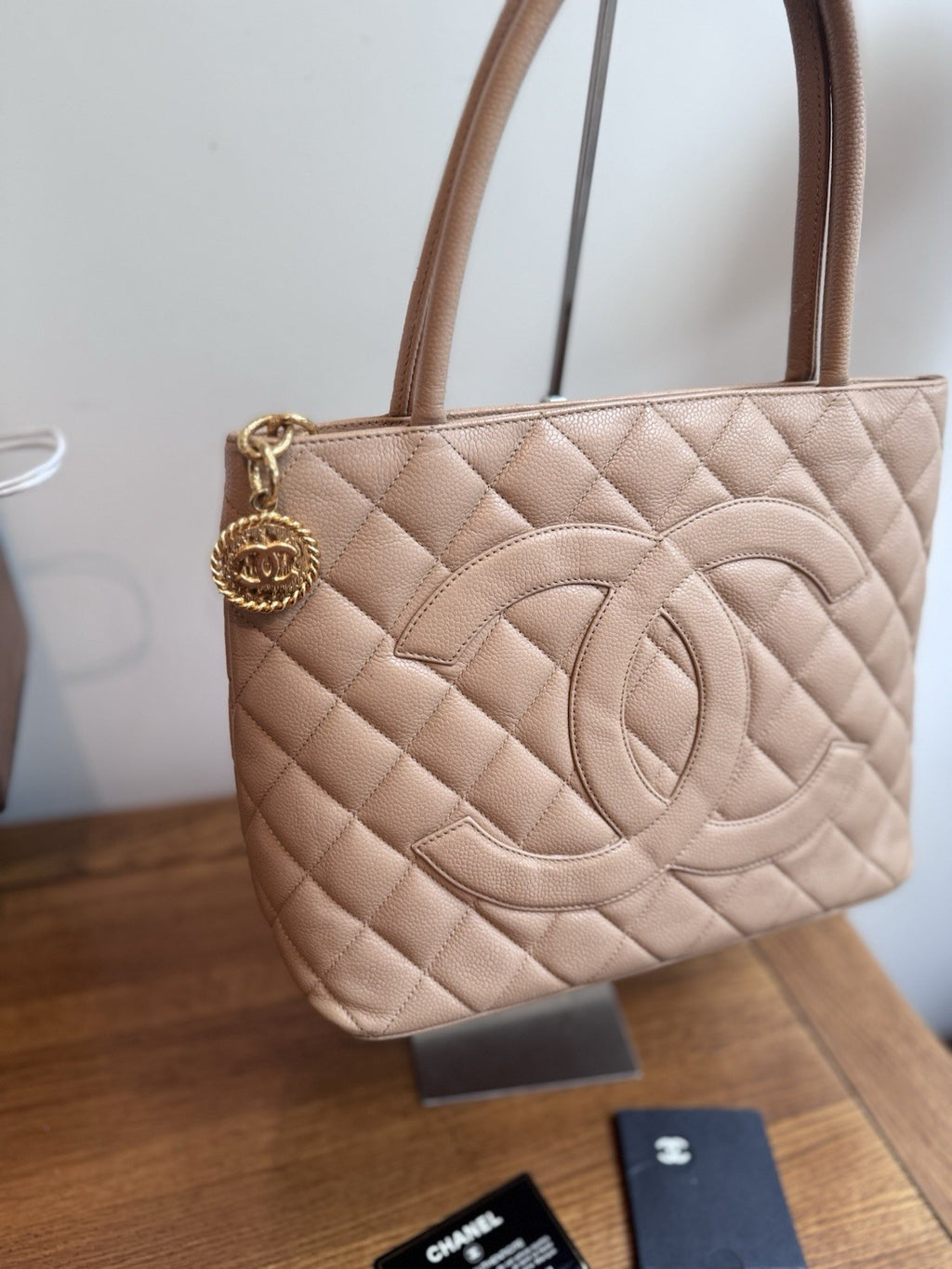 CHANEL Beige Medallion Tote,zip Closure quilted caviar leather